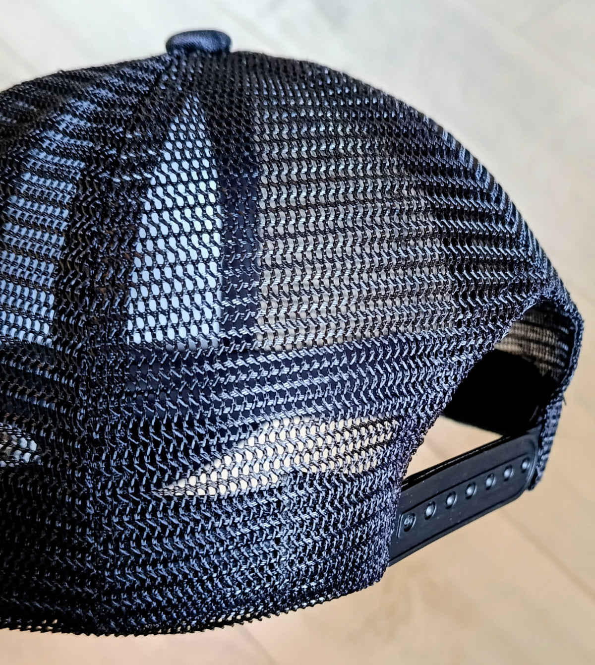Cypra Black Trucker Cap